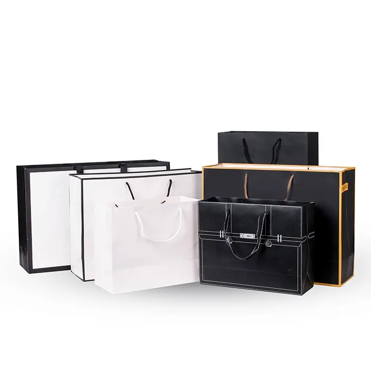 Sacchetti di carta per imballaggio artigianali di lusso alla moda all'ingrosso sacchetti di carta stampati con Logo personalizzato per lo Shopping gioielli da regalo sacchetti di carta per vino