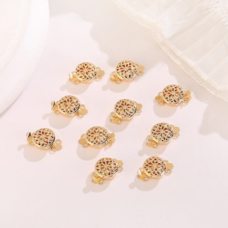 2. 18K gold round flower-shaped clasp, 10mm in diameter.