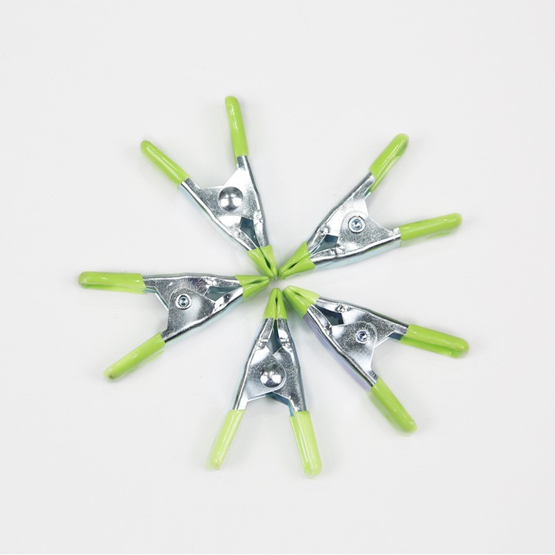 Green metal clips