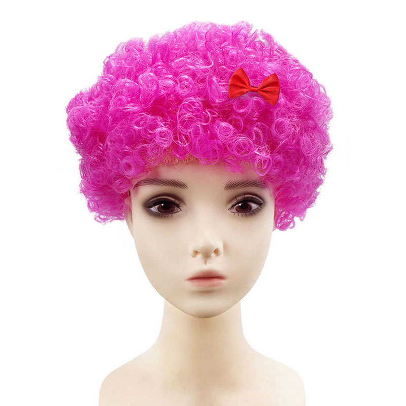 Fans wear pink afro-bowknot