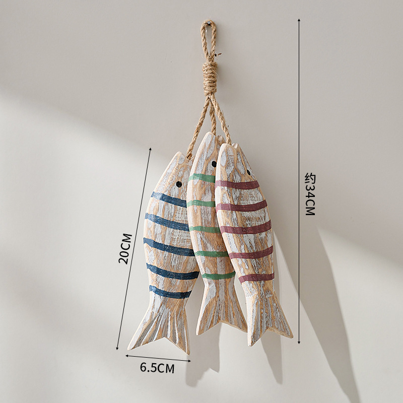 A string of 3 large striped fish