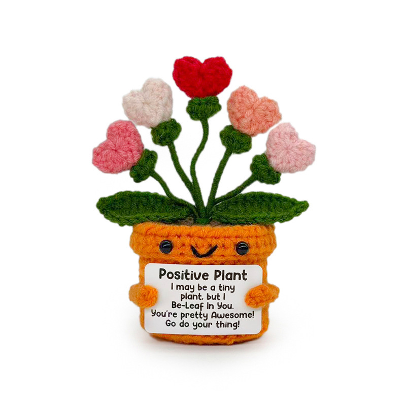 Petite plante en pot orange en forme de coeur dégradé