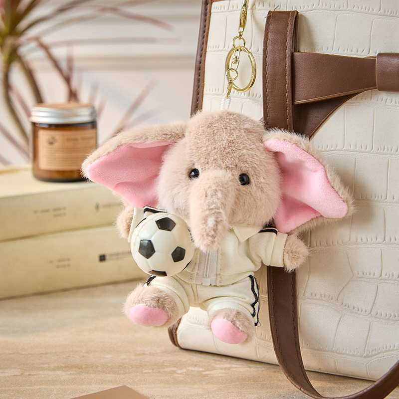 Traje deportivo beige fútbol bebé elefante