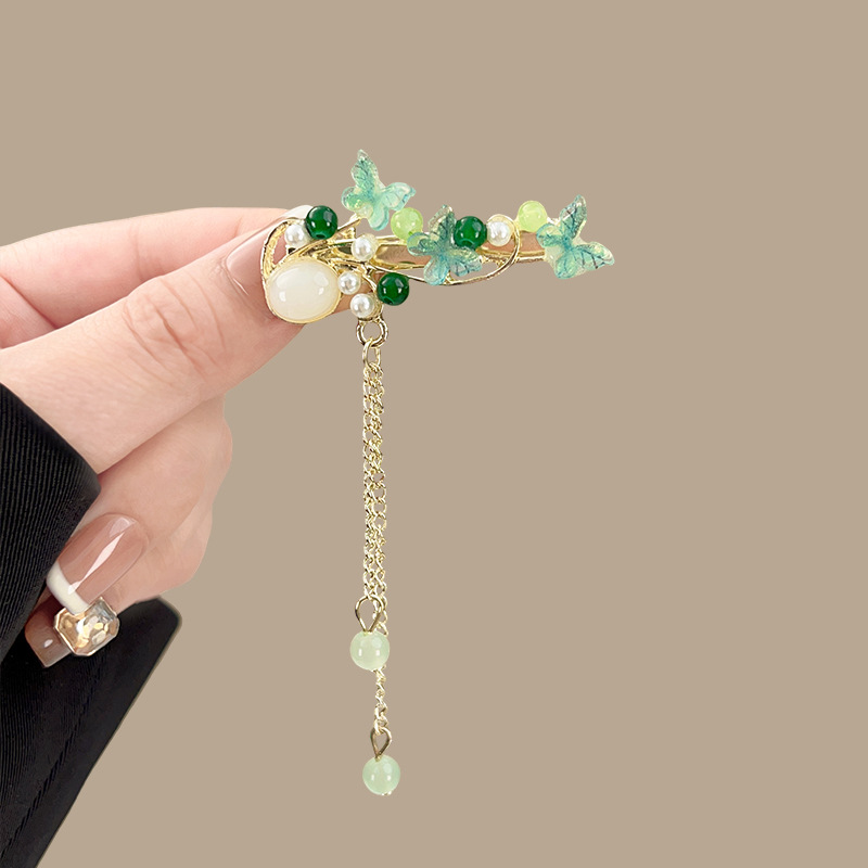 Perle papillon verte