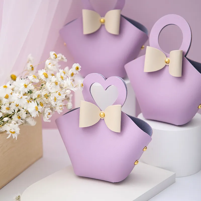 Anneau créatif Boîte de bonbons de mariage en cuir portable Boîte de distributions de faveurs de mariage Sacs Boîte d'emballage de bonbons de Noël Mini sac à main