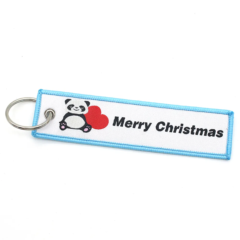 Anime Panda corazón Navidad cordones accesorios de tela con logotipo personalizado bordado tejido llavero regalo de recuerdo