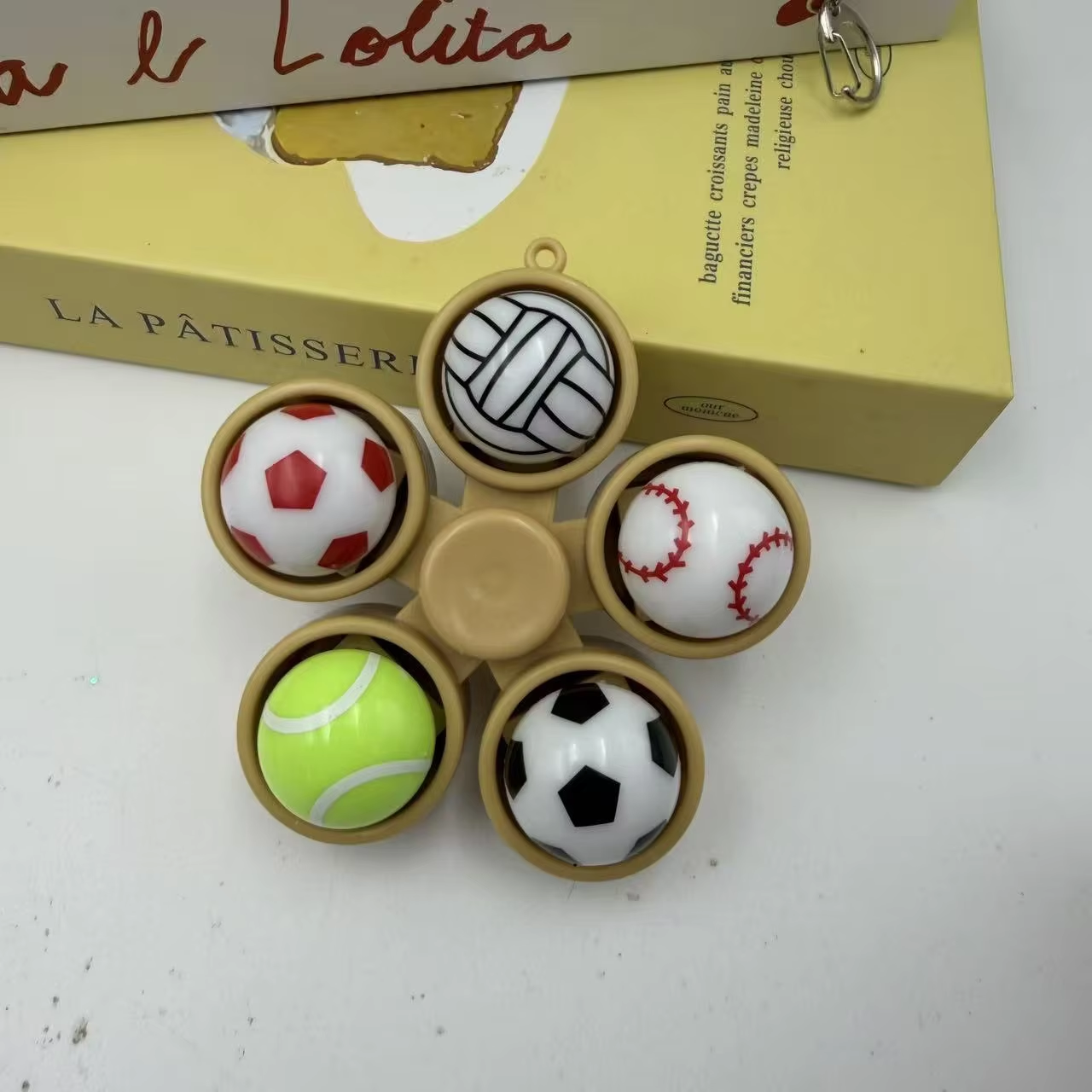 5 key baseball finger spinner