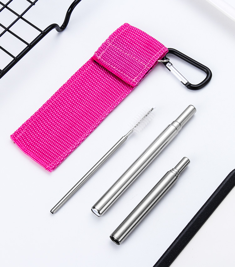straw set with pink pounch
