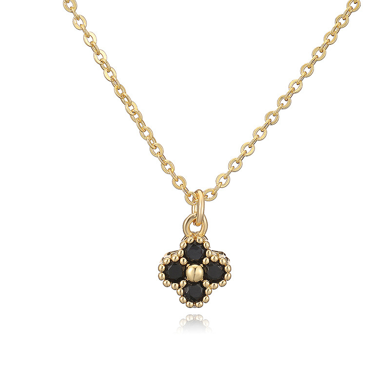 Collier trèfle à quatre feuilles en or noir et diamants