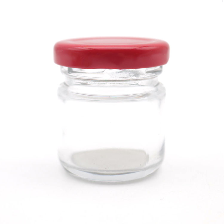 clear jar with red lid