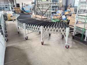 Cinta transportadora de descarga de carga de bolsas de 100kg motorizada flexible estándar Extensible, sistema de transporte expandible motorizado