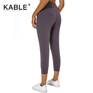מפעל ישיר אספקת Jogger כיס קצוץ יוגה מכנסיים מותאם אישית ספורט קאפרי מכנסיים