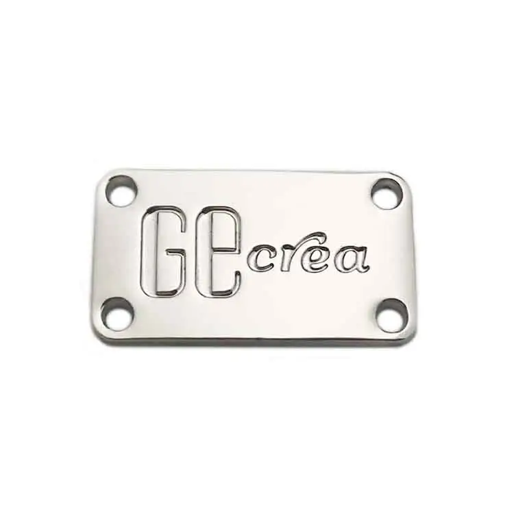 Etiquetas de metal personalizadas con logo de marca en relieve, para ropa, precio de fábrica