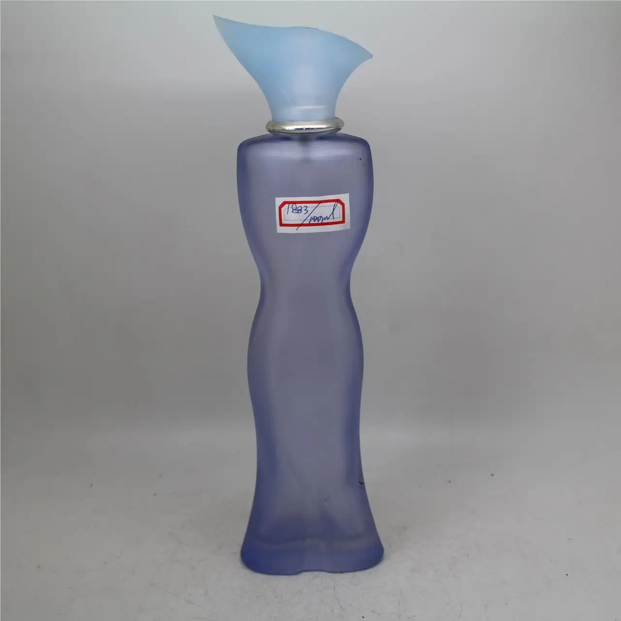100ml Lady shape factory cheap price empty light blue color glass perfume bottle