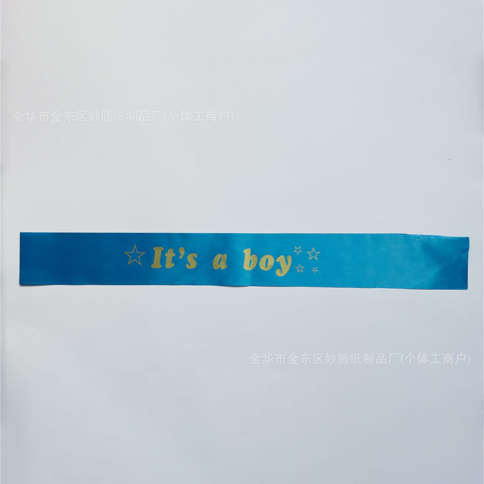 Blue satin fabric with gold lettering