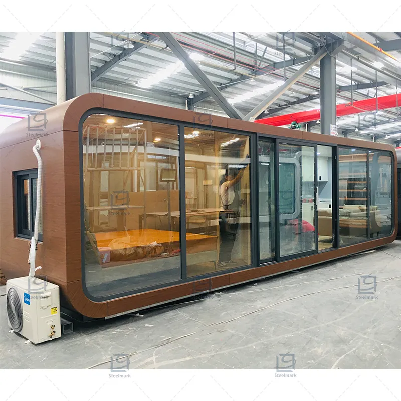 Guose Chất lượng cao Cửa hàng nhà máy đa chức năng Hạt gỗ màu tự nhiên táo cabin đúc sẵn container Nhà Màu Xanh lá cây