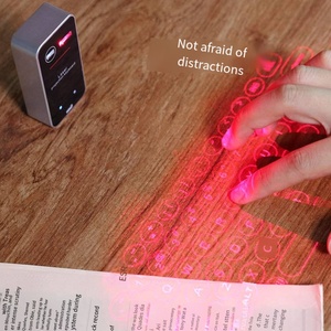 Nuevo diseño Teclado de proyección láser Teléfono móvil Computadora Teclado virtual infrarrojo inalámbrico