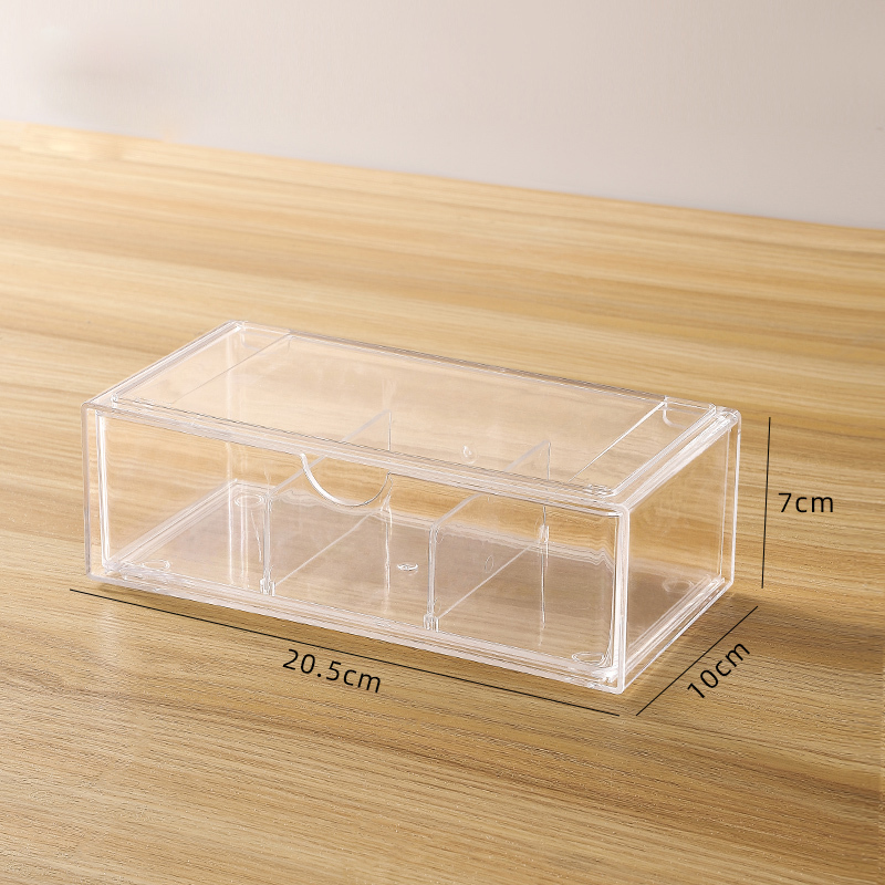 Stacked storage box drawer divided into compartments