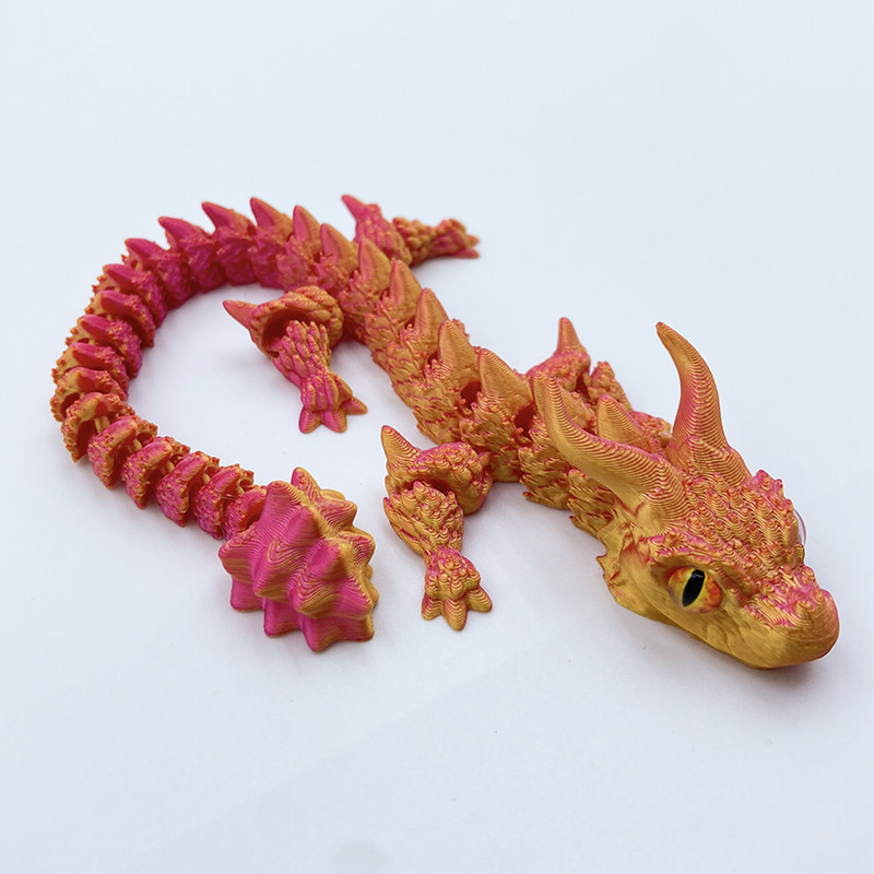 Ceratopsiano de oro rojo de 23,5 cm.