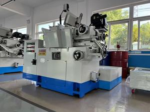 YASHIDA CG-12S <strong>CNC</strong> Centerless <strong>Cylindrical</strong> <strong>Grinding</strong> <strong>Machine</strong> <strong>Used</strong> with Motor and Engine Core Components for Surface <strong>Grinding</strong>