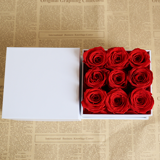 9 red roses in square box