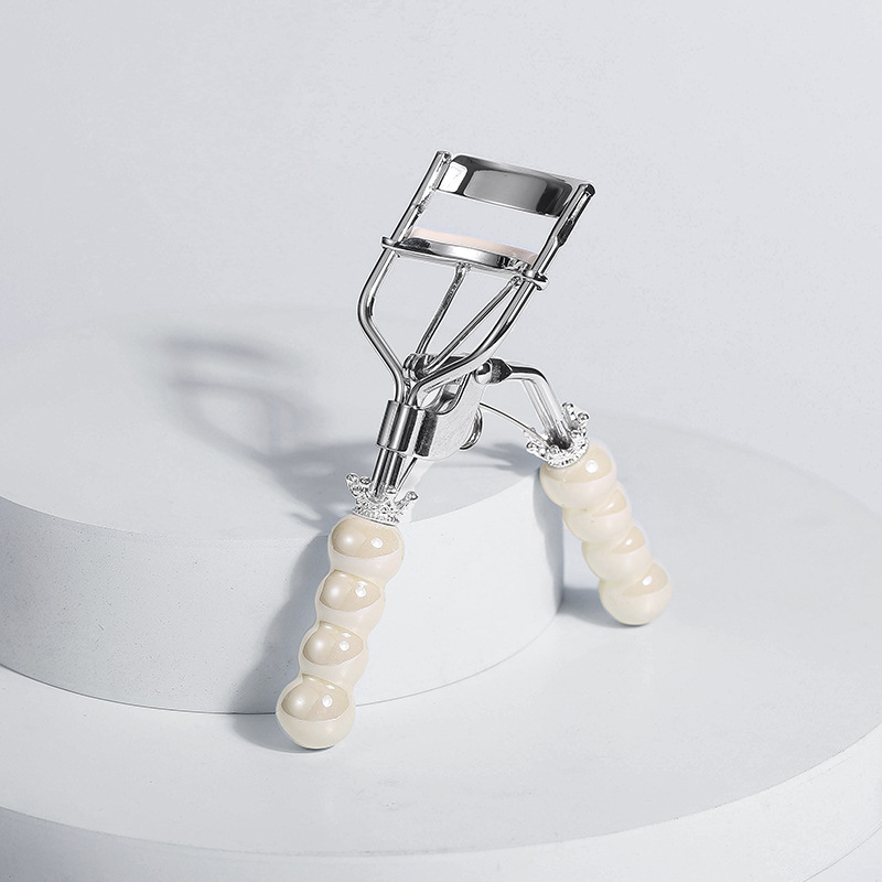 White crown-ceramic handle