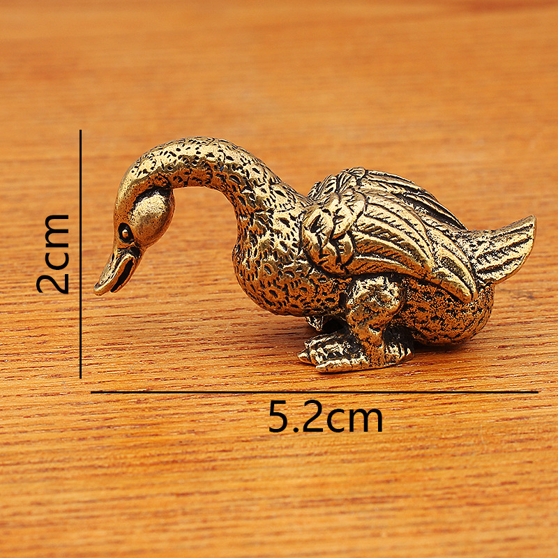 colorful Goose figurine with head facing down