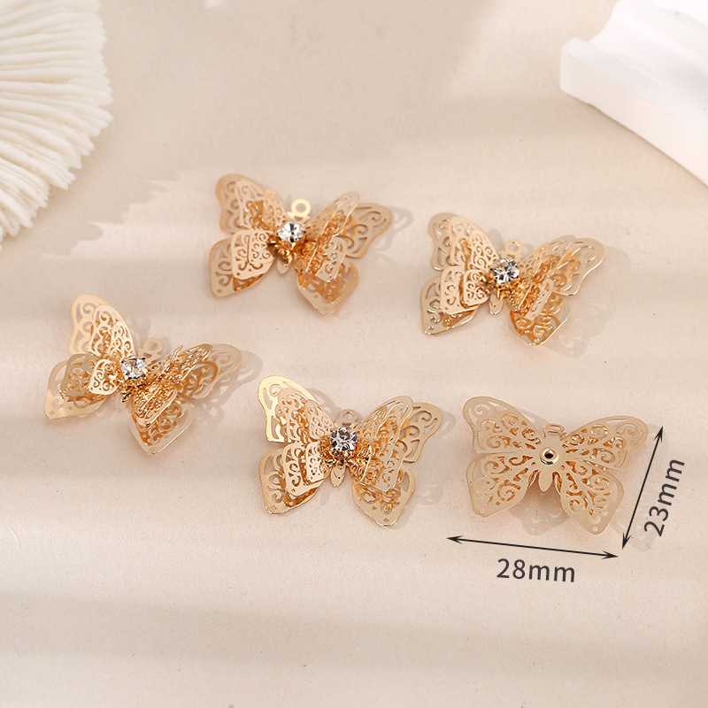 Style 4 Conception papillon à trois couches 23*28mm