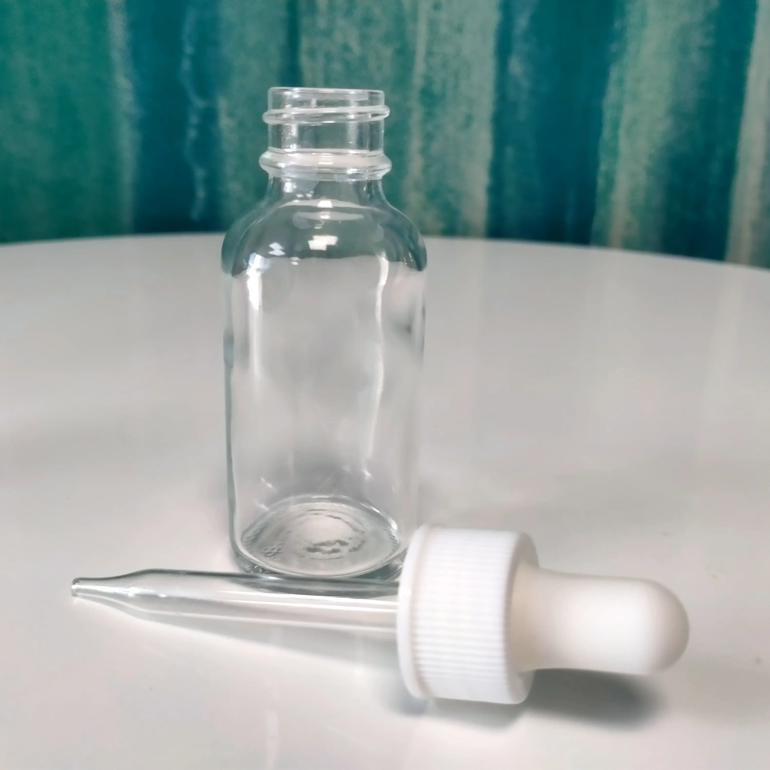 Botella redonda de vidrio transparente de 30ml, botella vacía de aceite esencial redonda pequeña