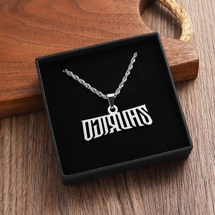 letter necklace with packing boxes
