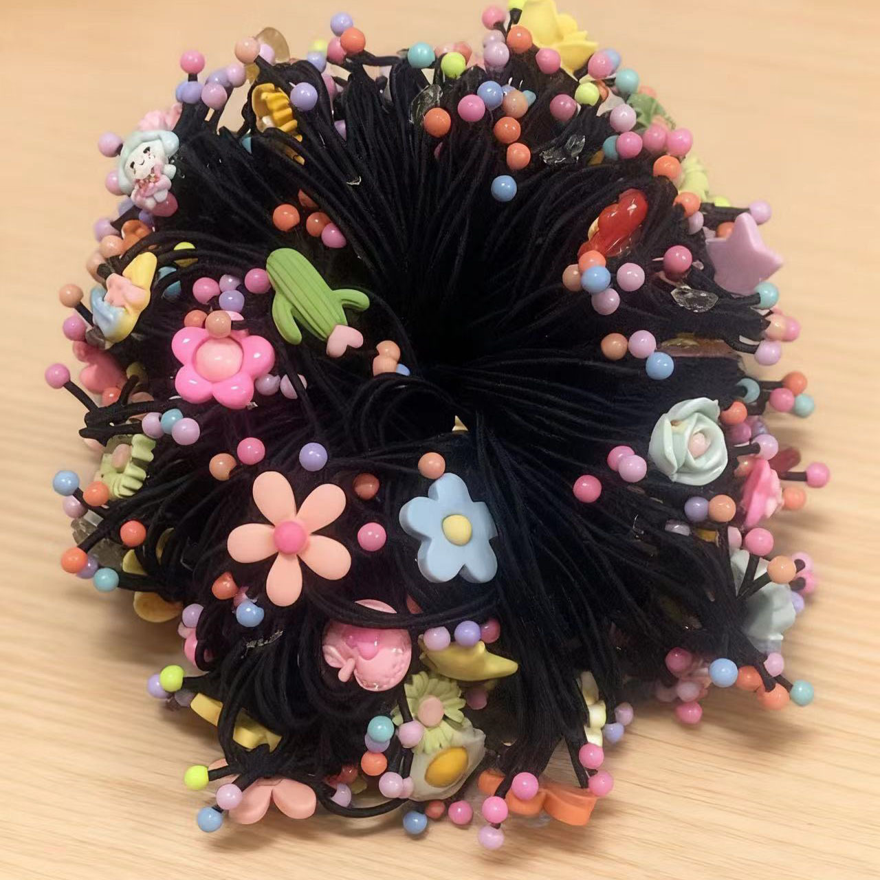 Élastique à cheveux pour enfants de couleurs mélangées inspiré des plantes
