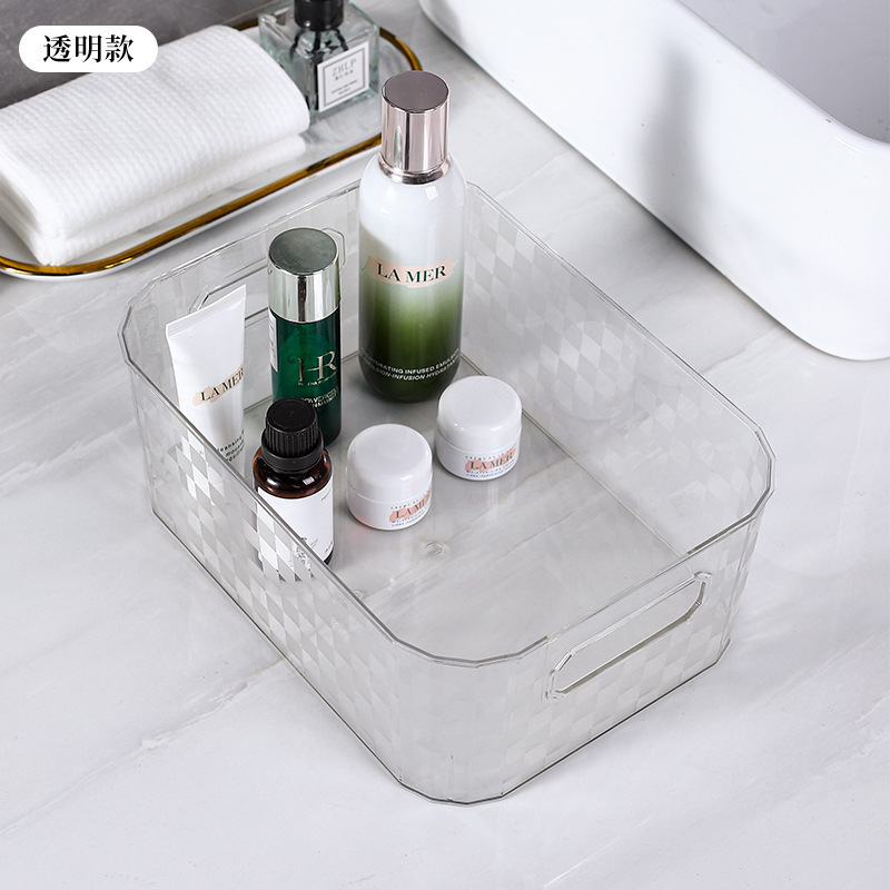 Small transparent storage box with a checkerboard pattern.