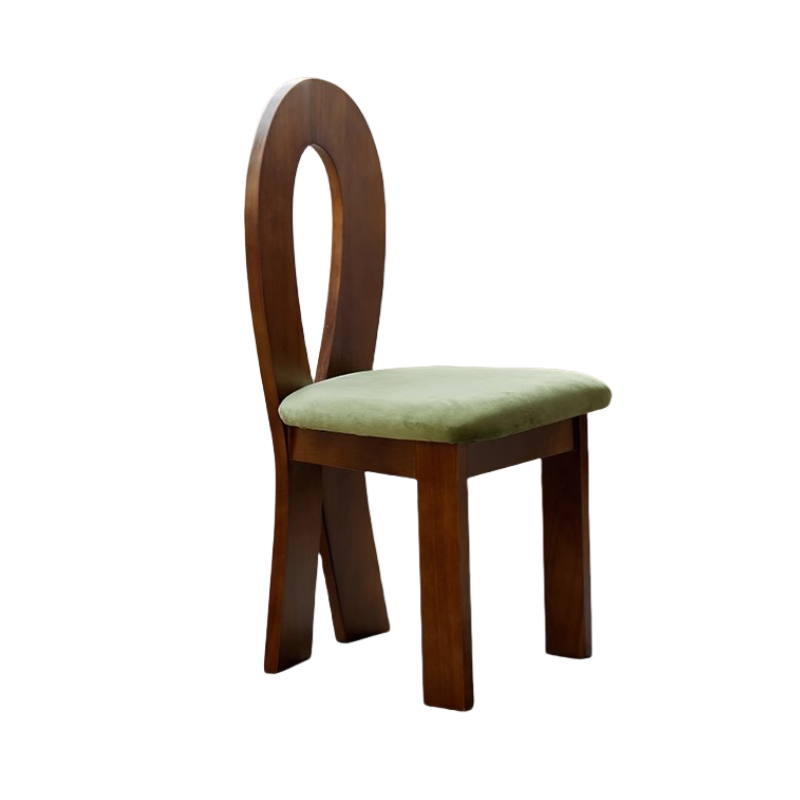 Silla sirena de terciopelo verde con estructura de nogal