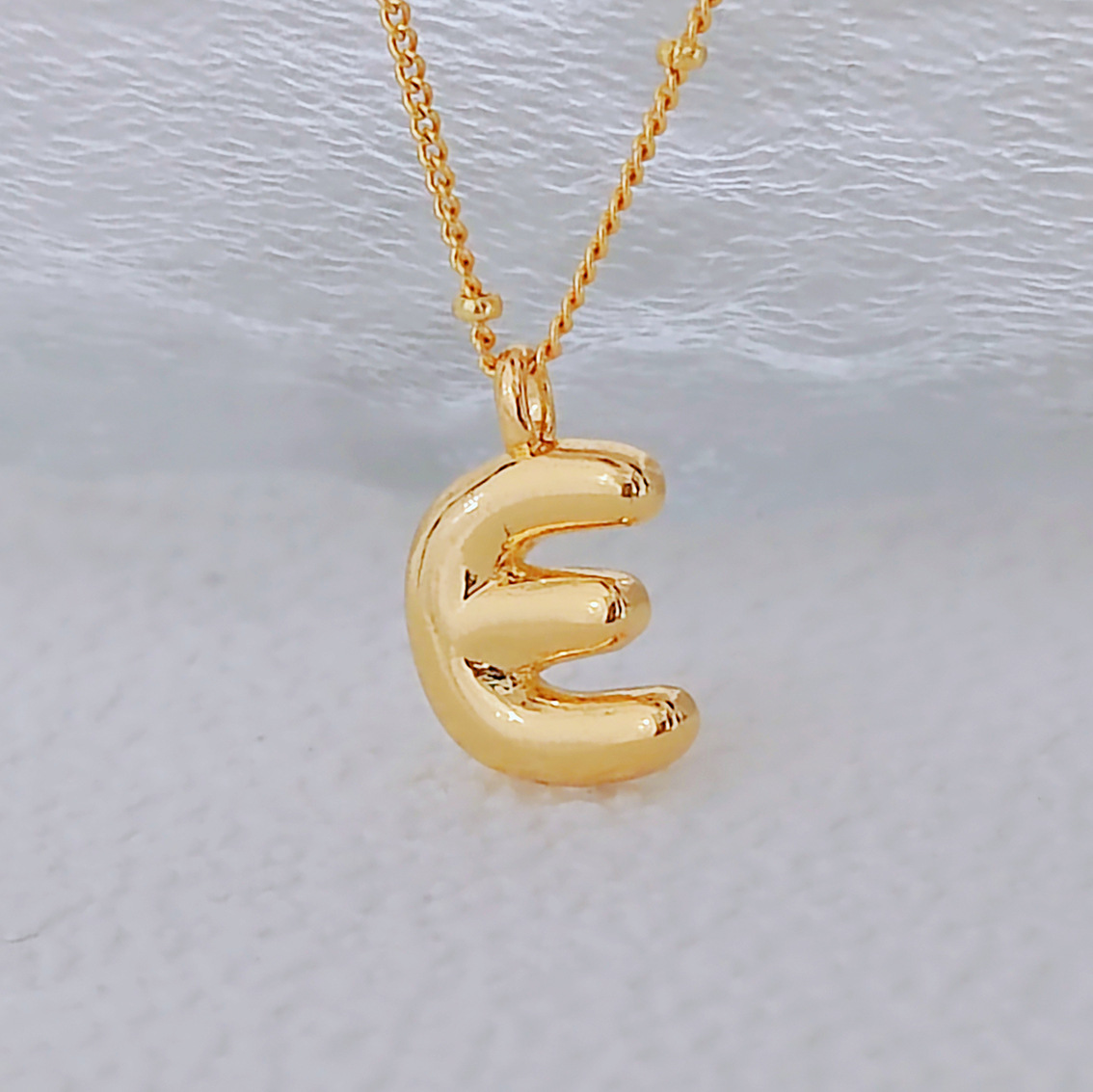 E