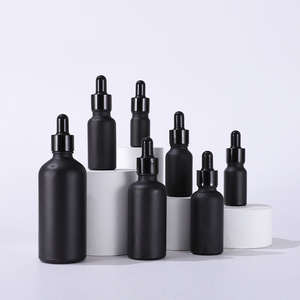 Logotipo personalizado 5ml 10ml 15ml 20ml botella redonda vacía de aceite esencial cosmético 30ml 50ml 100mL botella cuentagotas de suero de vidrio negro mate - Product Image 1