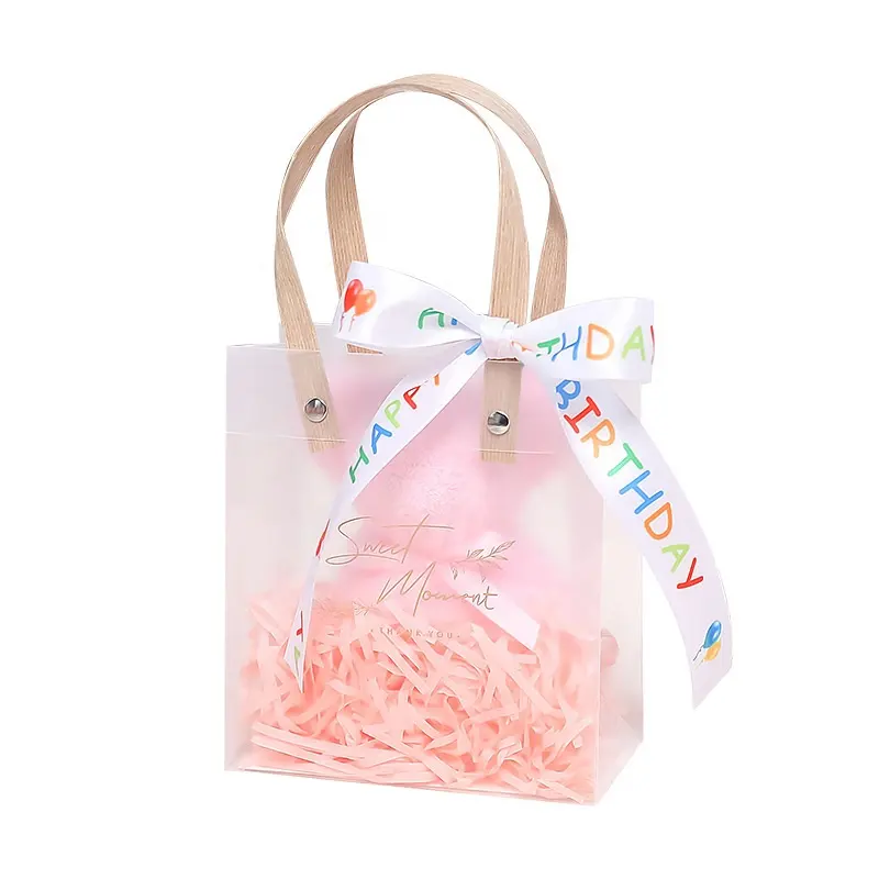कस्टम पुन: प्रयोज्य शीर्ष गुणवत्ता साफ़ पीवीसी प्लास्टिक शॉपिंग बैग लोगो के साथ उपहार के लिए वाटरप्रूफ पारदर्शी हैंडल बैग पैकिंग