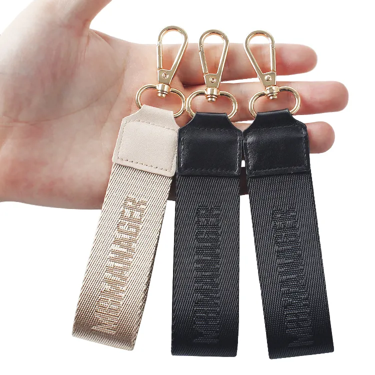 사용자 정의 디자인 짠 자수 루루 손목 스트랩 키 끈 선물 판촉 브랜드 로고 가죽 열쇠 고리