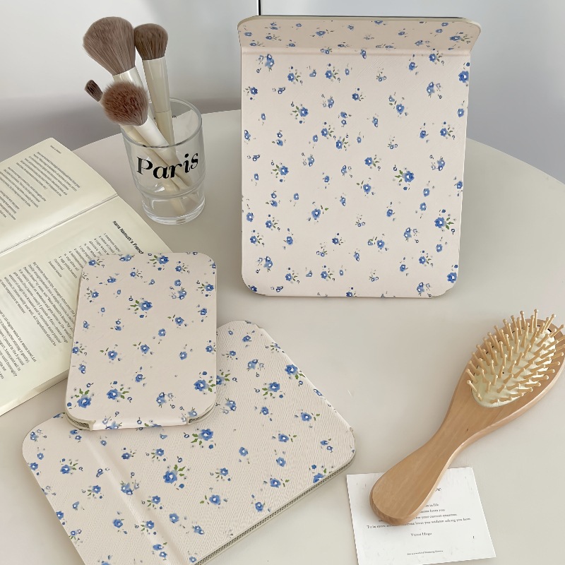 White background with blue floral pattern