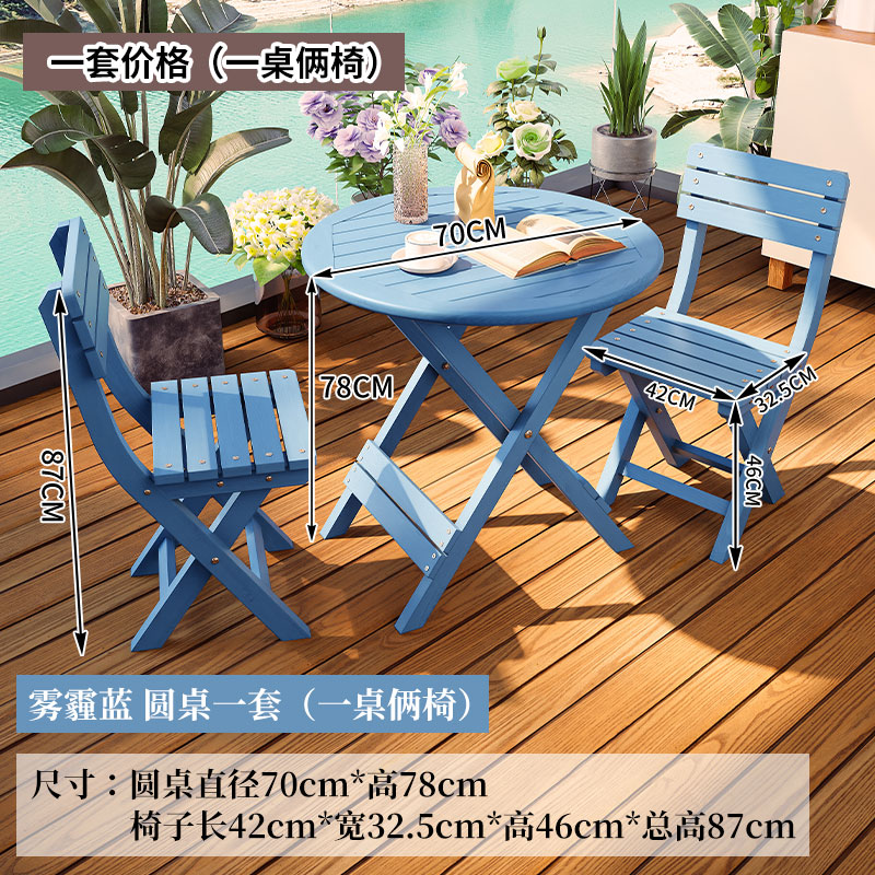 blue round table, two upholstered chairs