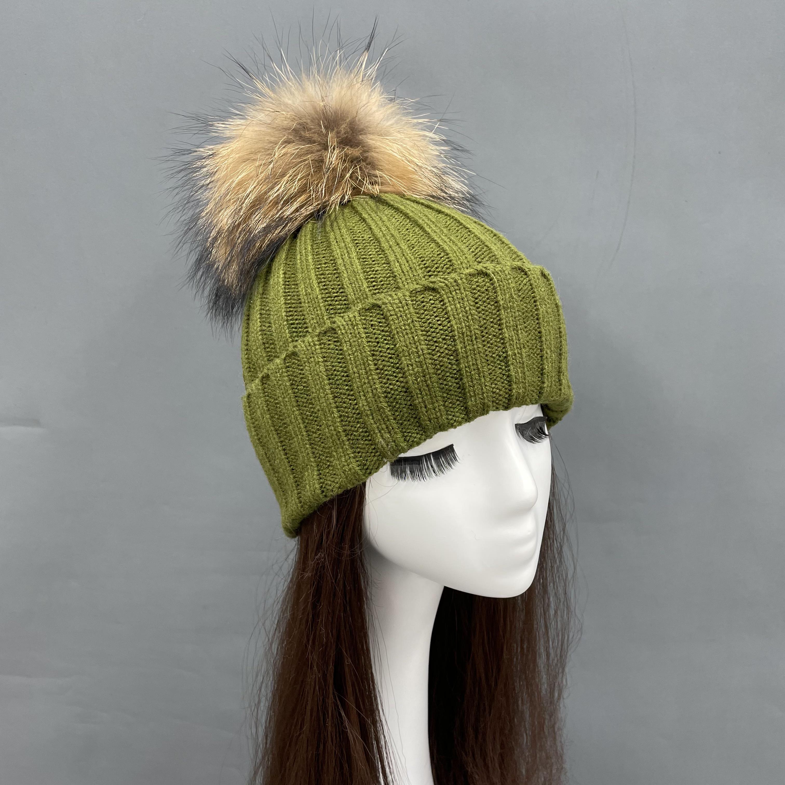 Green knitted beanie hat