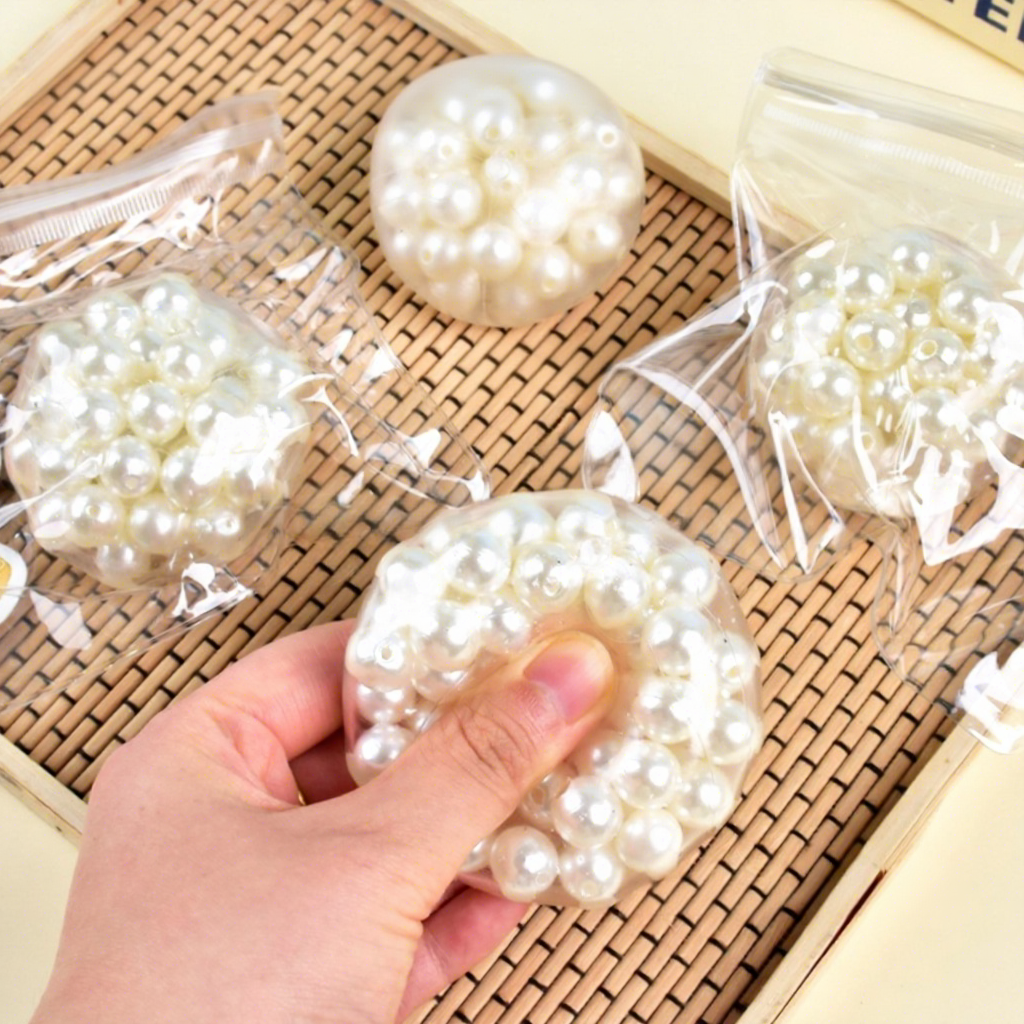 Balle hochet en perles de 6 cm