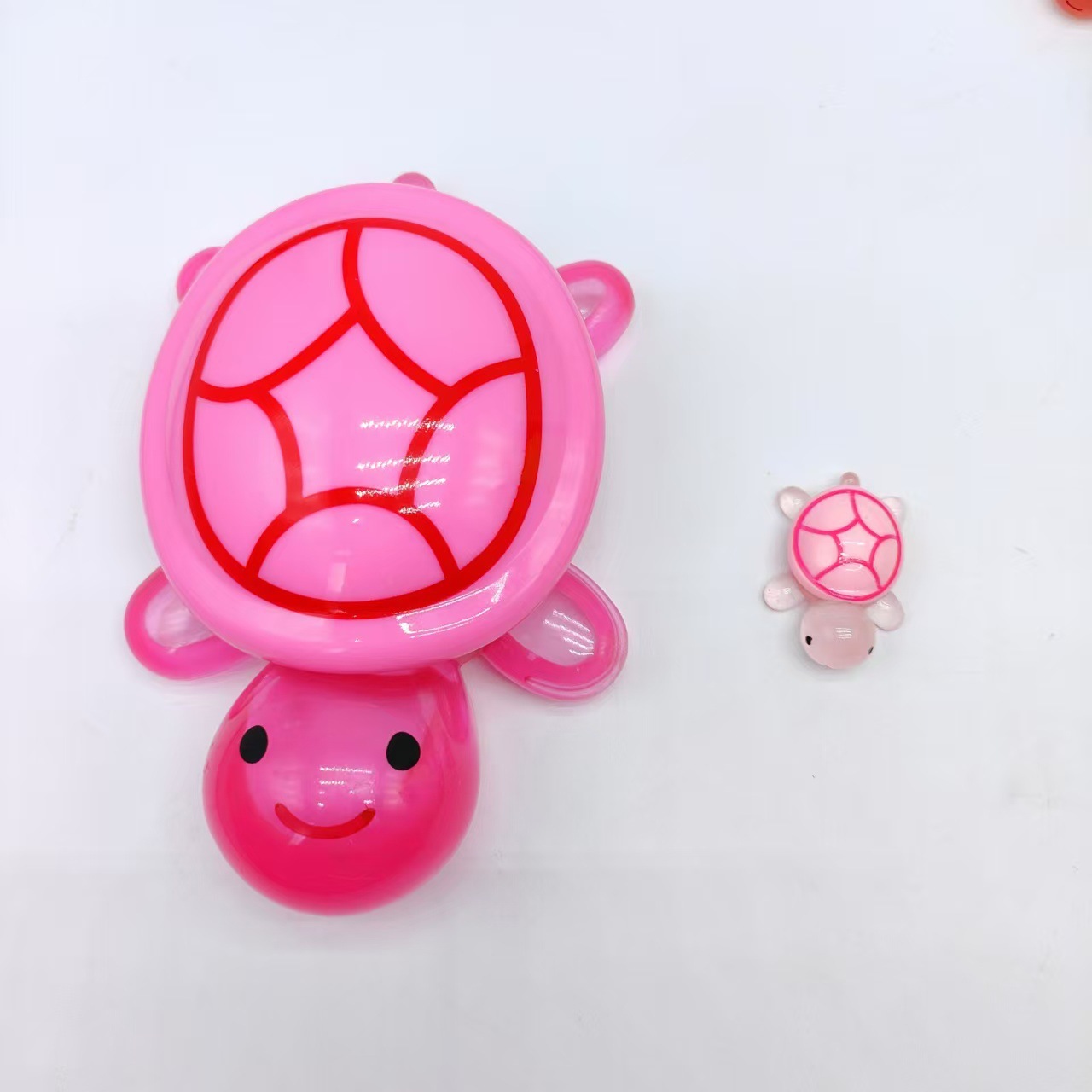 A 17CM pink turtle with an open lid