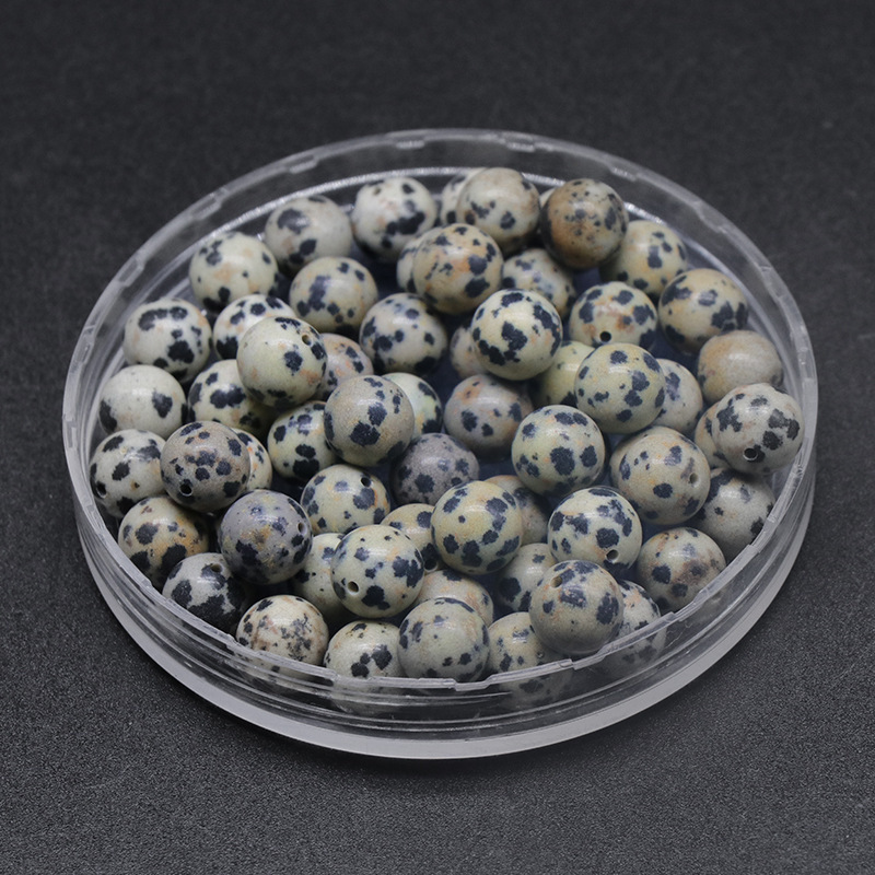 Pezzo singolo di diaspro dalmata con mezzo foro da 8 mm
