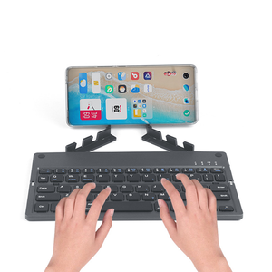 Teclado de dientes azules de 60 teclas Mini silencioso plegable portátil ligero recargable Estructura de pie de tijera Mini teclado inalámbrico - Product Image 5