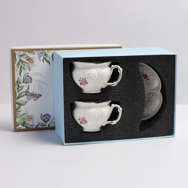 white-double cup and saucer