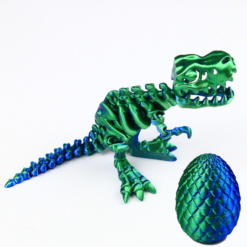 Tyrannosaure rex bleu-vert en soie de 16 cm - Œuf de 10 cm