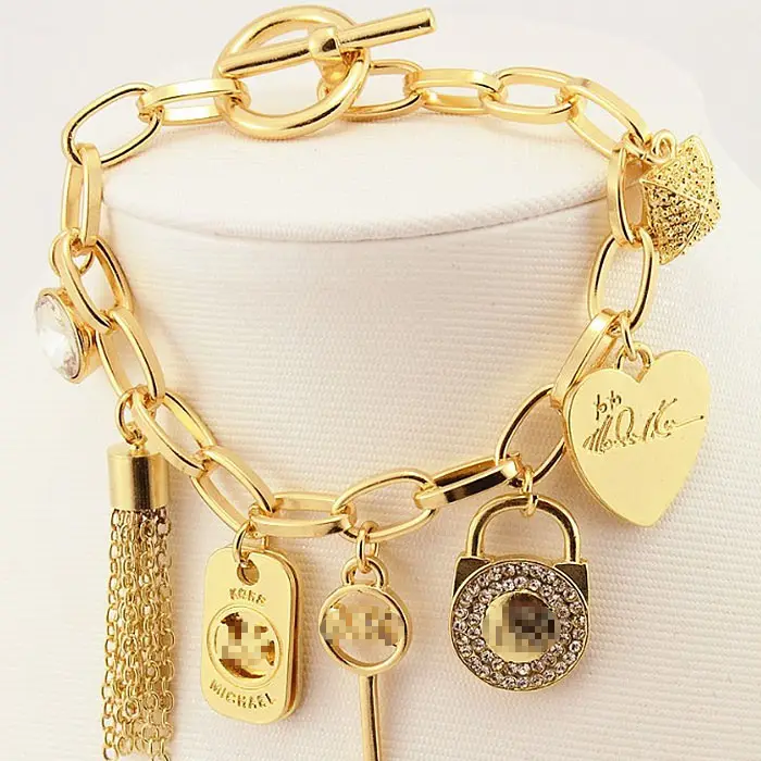 Alta calidad al por mayor barato encanto pulsera cadena encanto pulsera chapado en oro pulseras