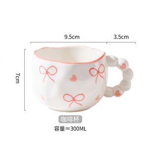 批发贴牌咖啡杯带茶托创意珠串手绘可爱心形陶瓷咖啡杯