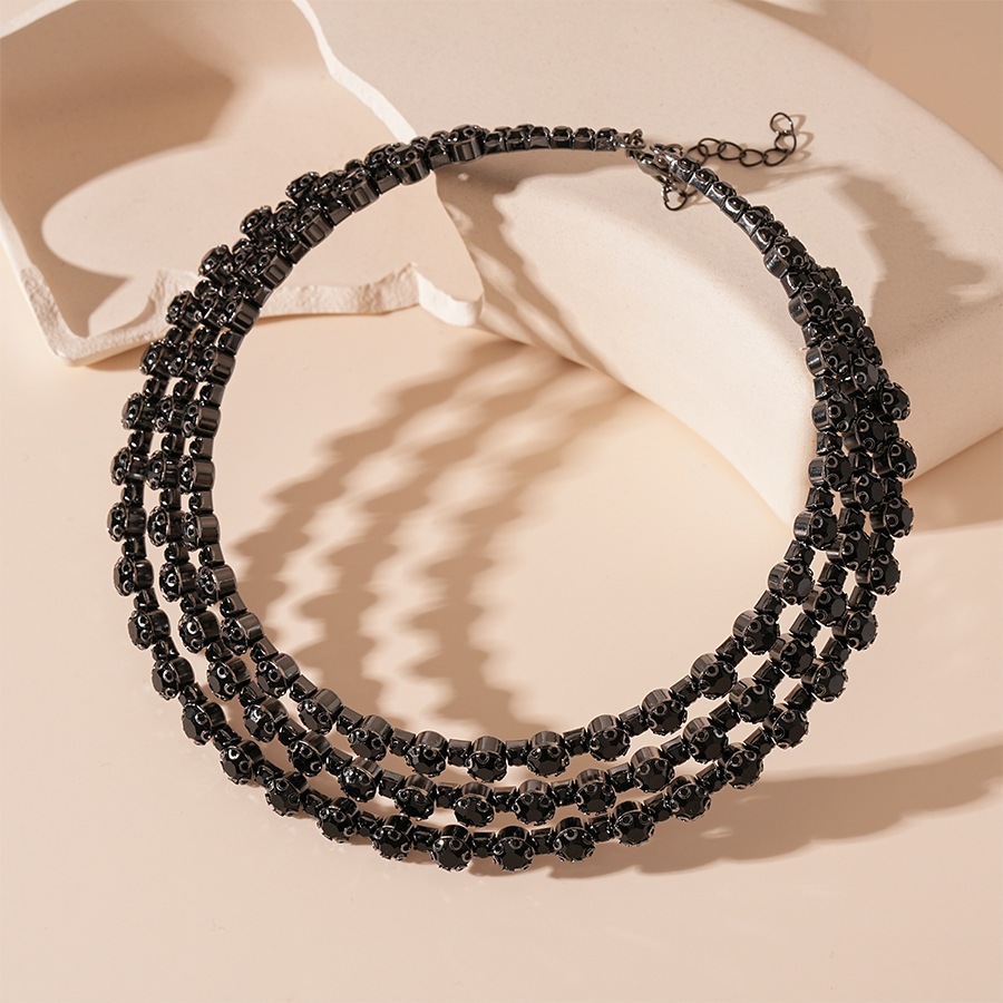 8 # collier-pistolet noir