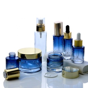 Juego de envases vacíos personalizados para el cuidado de la piel, Mini botellas redondas de 5ml, 10ml, 15ml, 20ml, 30ml, 50ml, 60ml, 80ml, 100ml, 120ml, frasco de vidrio azul (GSC03) - Product Image 1